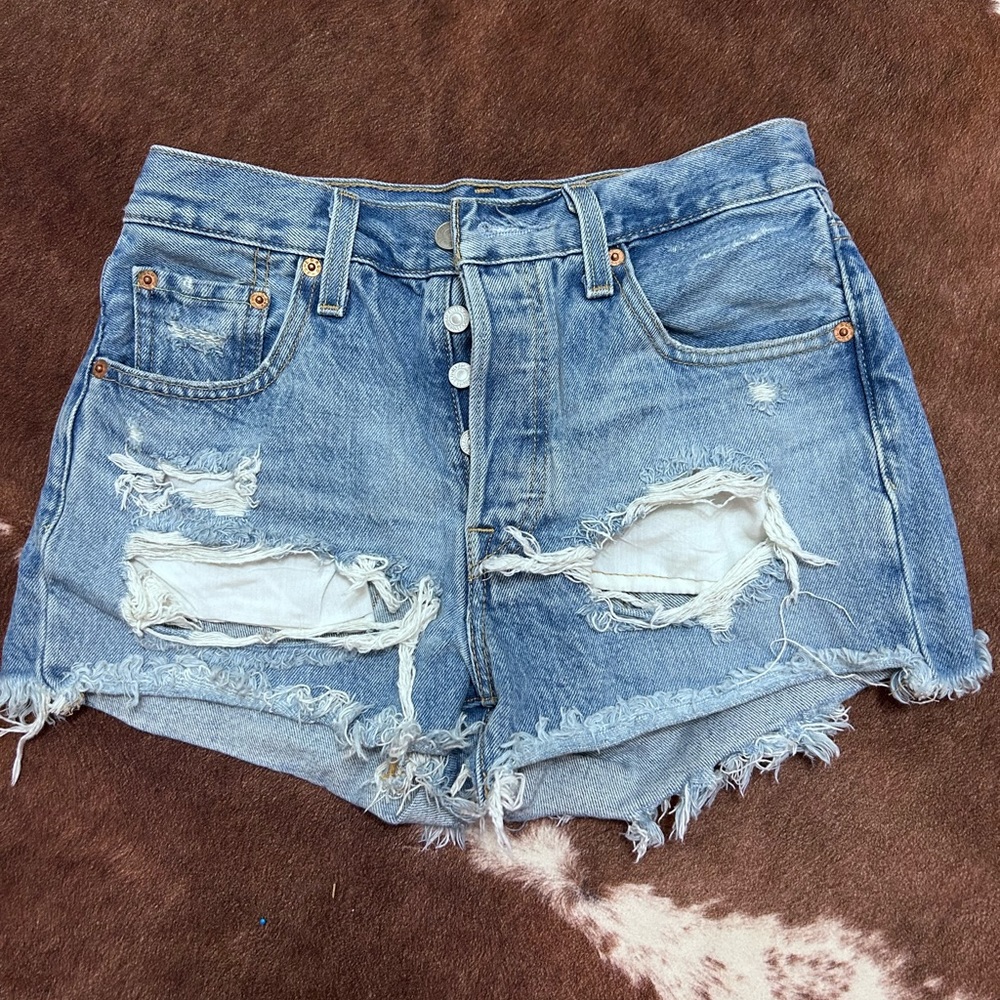 distressed blue jean shorts